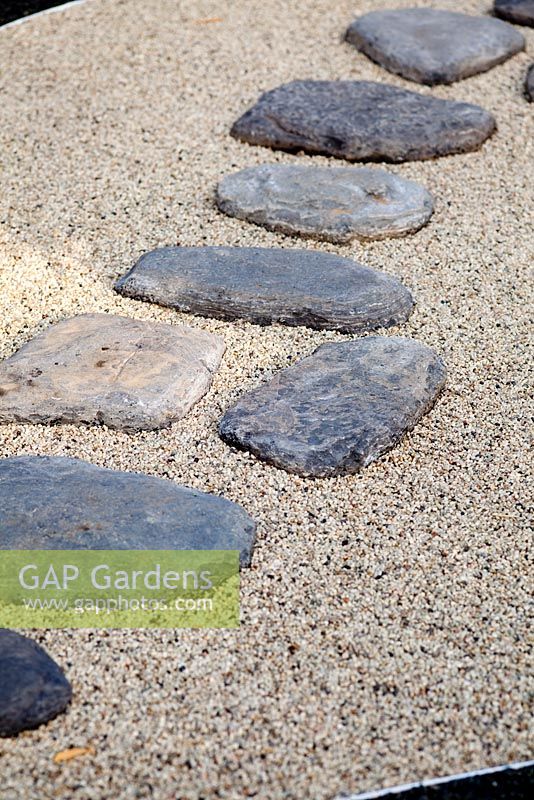 Stepping stones on gravel 