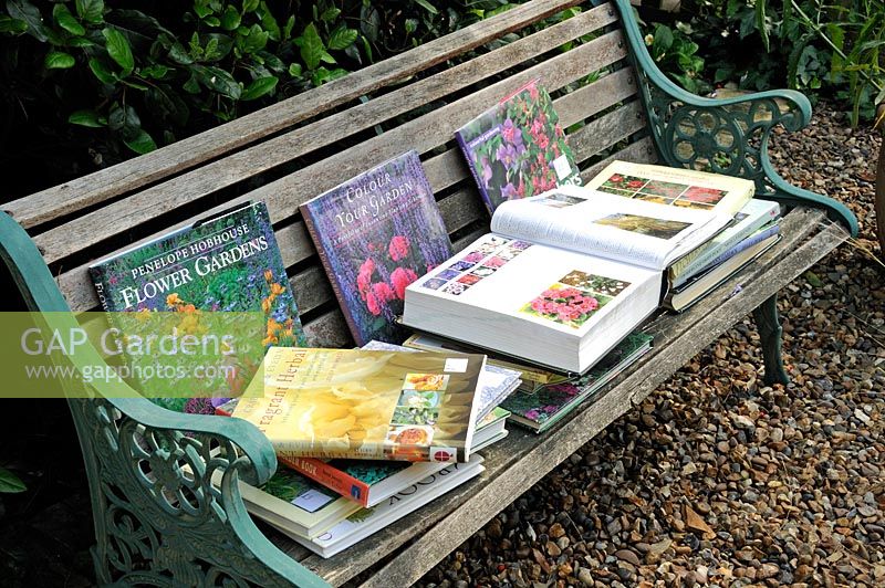 Gardening books for sale displayed on bench, in aid of the National Garden Scheme NGS charity