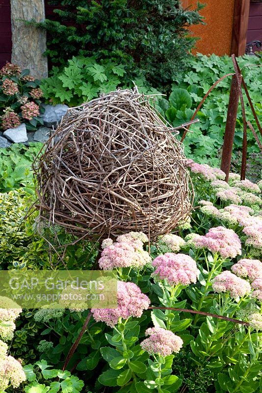 Decorative ball in flowerbed - Marx garden