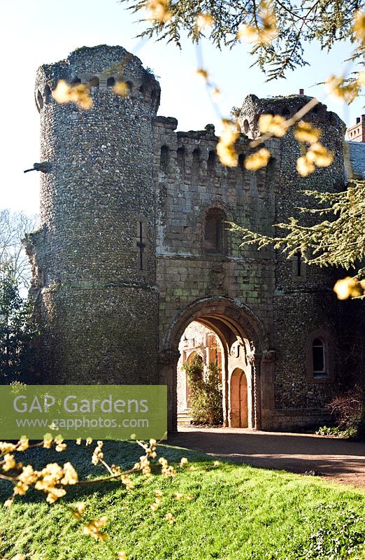 Old castle entrance and garden in February 