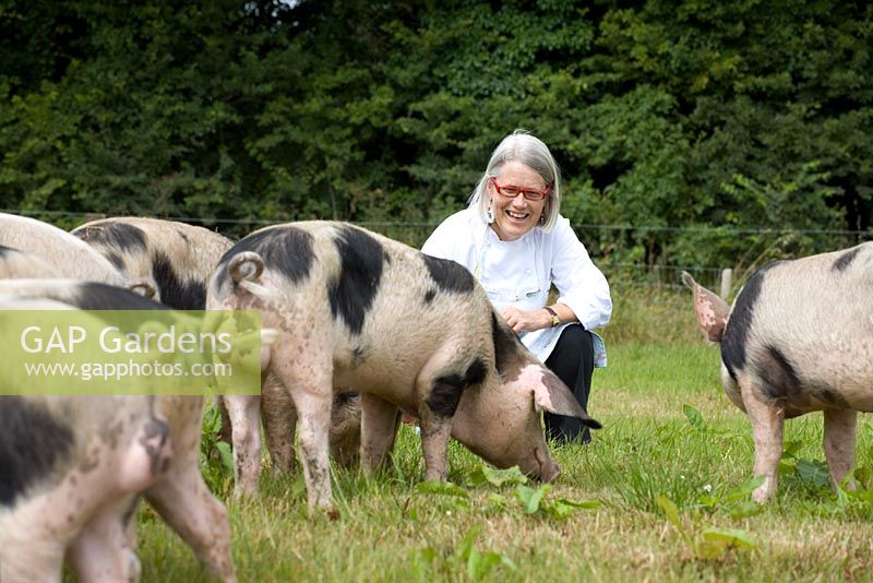 Darina Allen with pigs - Ballymaloe Cookery School