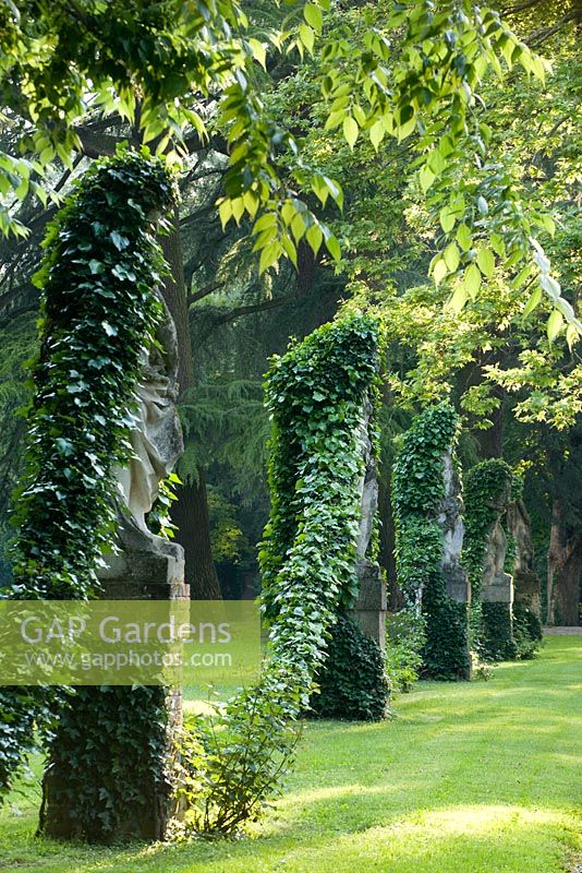 Avenue of statues - Grazzano Visconti garden, Piacenza, Italy
