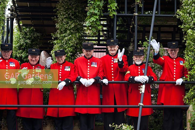 The Westland Magical Garden, a multi-level pyramid, seen here with the Chelsea Pensioners on board. Sponsor - Westland Horticulture.