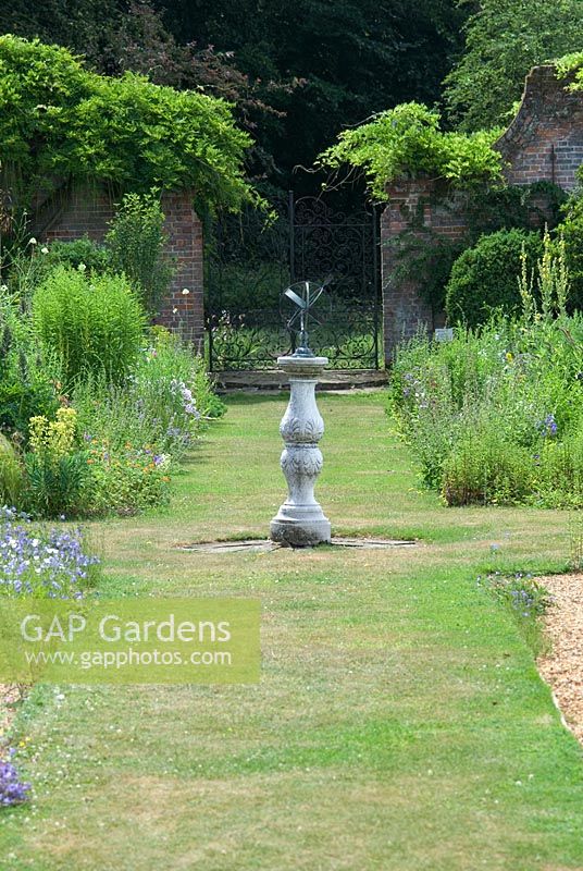 A sundial at Bellflower Nursery in the walled Garden at Langham Hall in Suffolk, home to The National Collection of Alpine Campanulas 