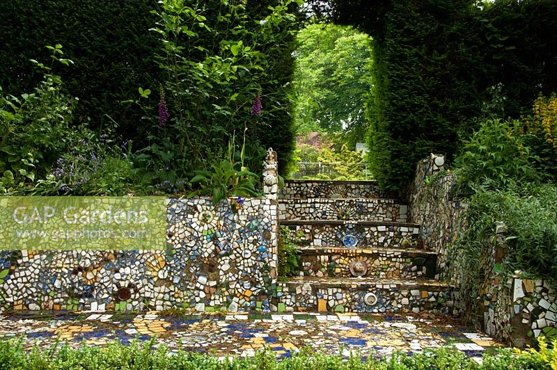 The mosaic terrace steps leading to the tennis court. Marle Place