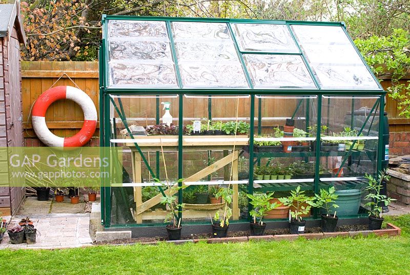 Greenhouse with alluminium frame and plastic windows