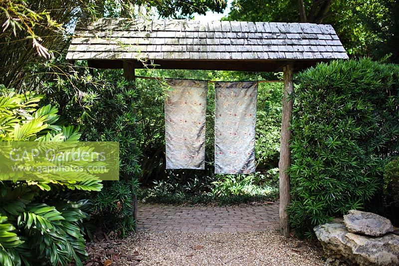 Silk panels create a soft transition into the Japanese Garden - Heathcote Botanical Gardens, Florida