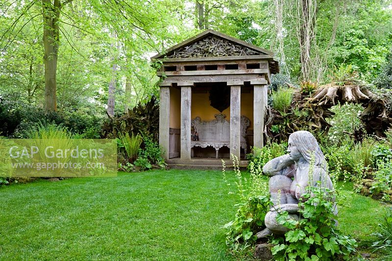 The Stumpery with one of the two temples and a statue 'Goddess of the Woods' - Highgrove Garden, May 2008.