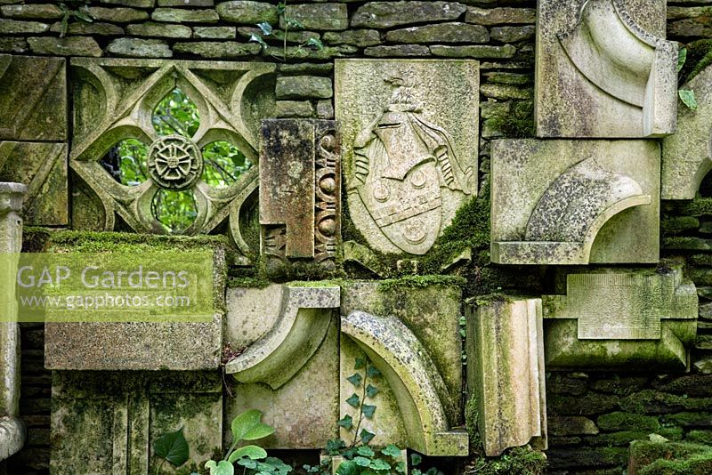 The 'Wall of Gifts' in the Stumpery containing various pieces of architectural stone, some given to HRH The King others collected by him. 