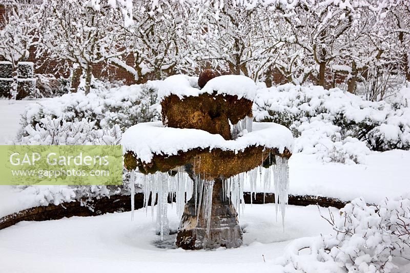 The Walled Garden and fountain with snow and ice, Highgrove Garden, January 2010. 