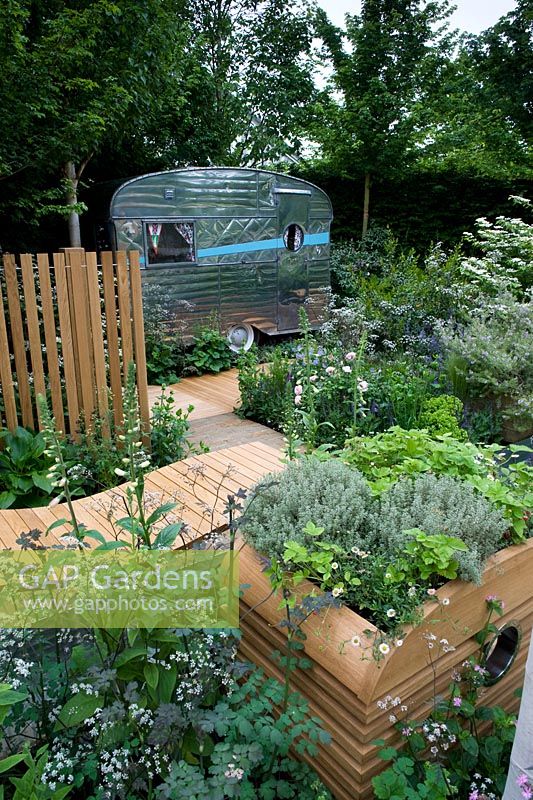 Caravan in modern garden 