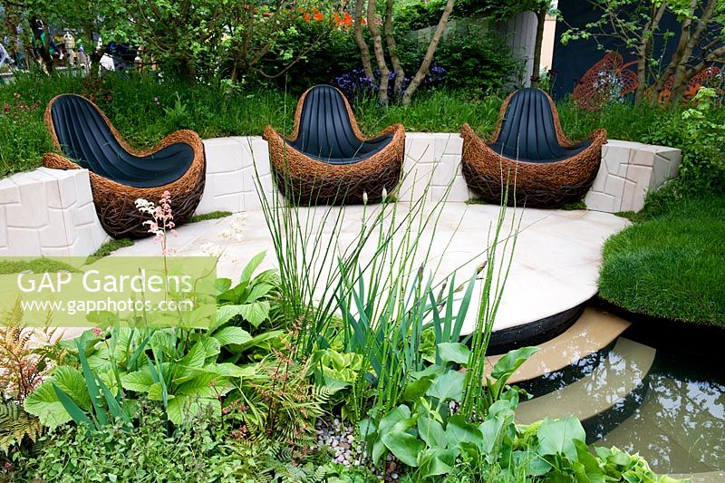 Tranquillity set in Stone. Bronze Medal Winner. Chelsea Flower Show 2012. Birds nest seating
