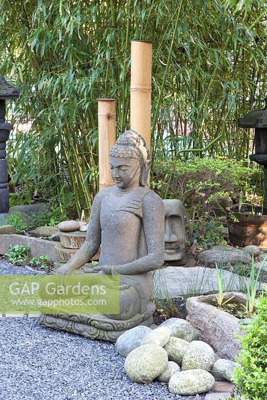 Buddha statue in Oriental style garden 