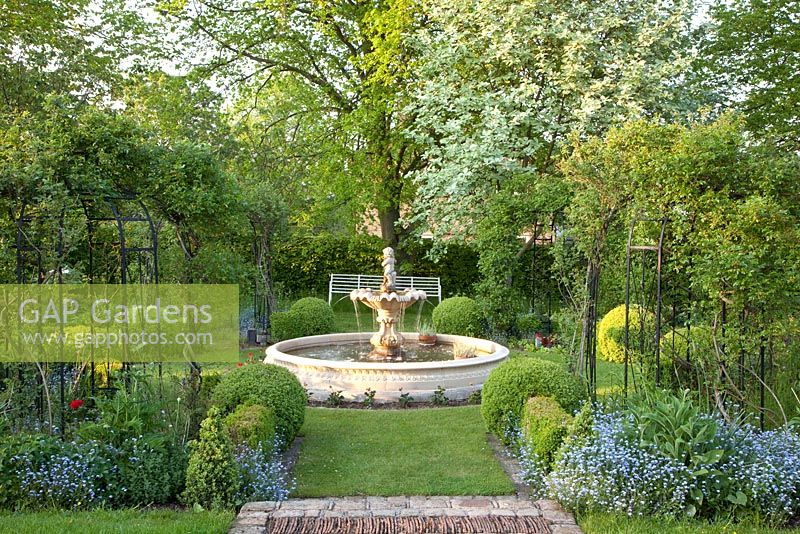 Formal garden with fountains, Sorbus aria, Tilia cordata - Manor House 