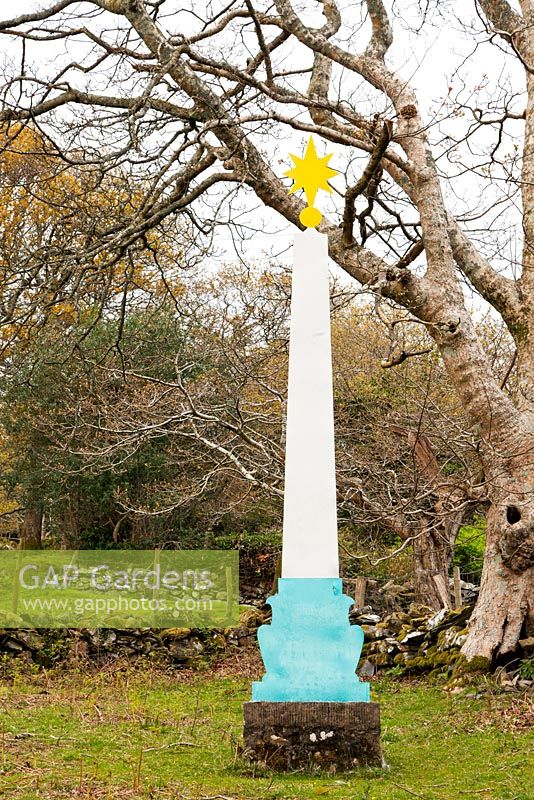 Plas Brondanw Garden, Wales. Gold painted star in the Woodland Garden