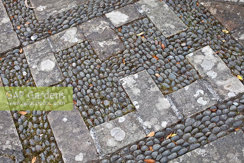Cobble and brick paving
