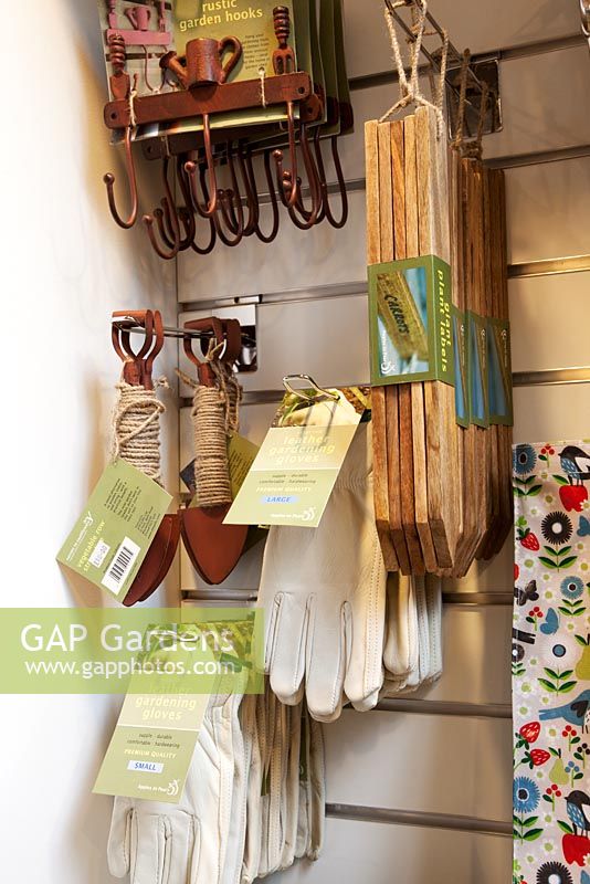 The Garden Museum. Items to buy in the shop. Gardening gloves, hooks and plant labels.