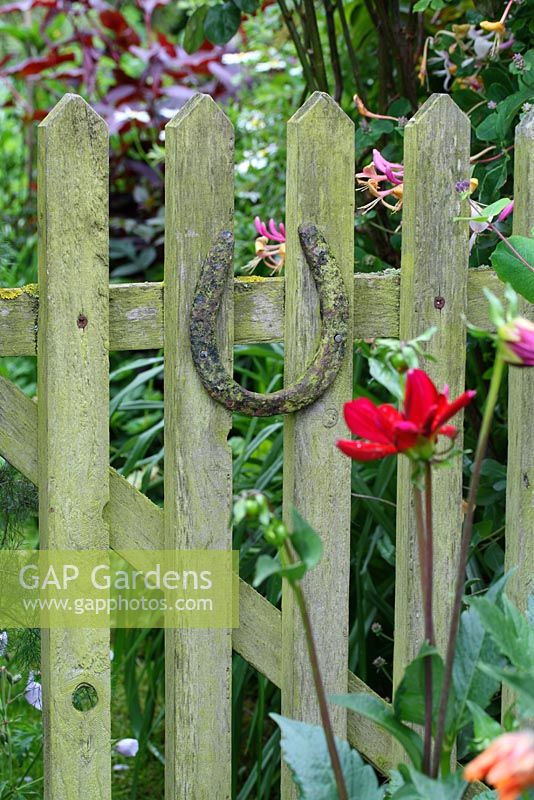 Horseshoe on rustic wooden gate in the front garden - The Lizard, Wymondham, Norfolk