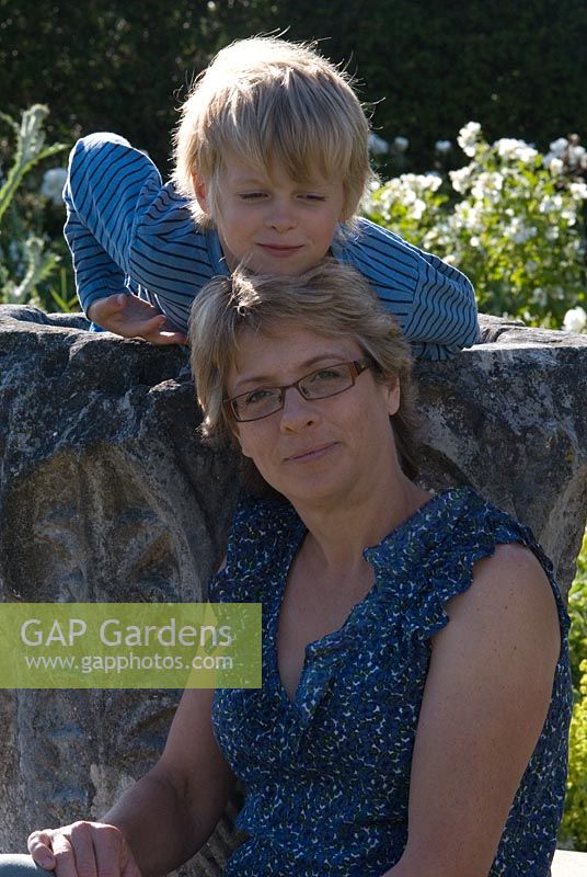 Amelia Singleton and her son in The White Garden. Wood Farm, June