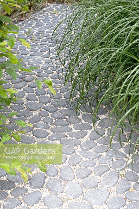 Stone paved path in garden designed by Jacqueline Volker at the Garden festival at Appeltern.