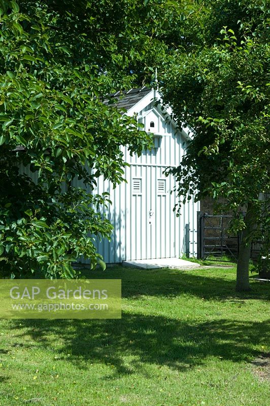 Metal garden shed with dovecote