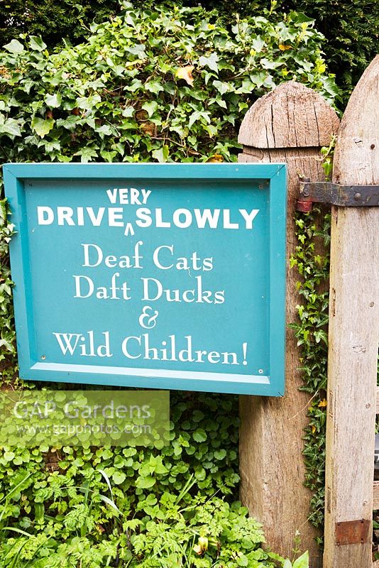 Humurous garden sign at Mill Dene, Gloucestershire