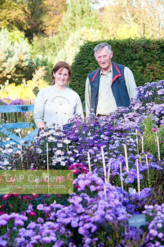 Portrait of Owner and his daughter, Helen amongst their National Collection of Autumn Asters - The Picton Garden, Colwall