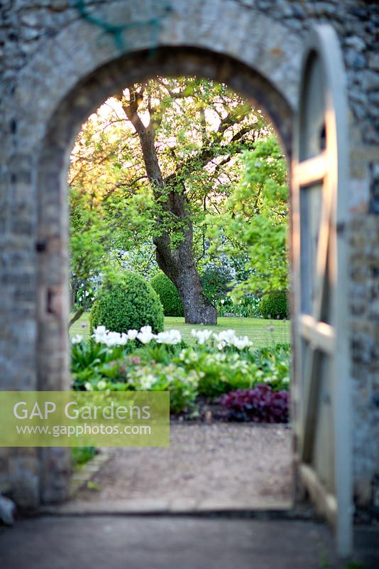 View through door to walled garden at Wretham Lodge, Norfolk