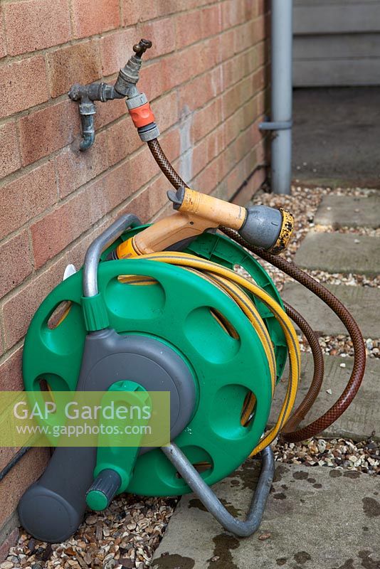 Hosepipe reel connected to external tap