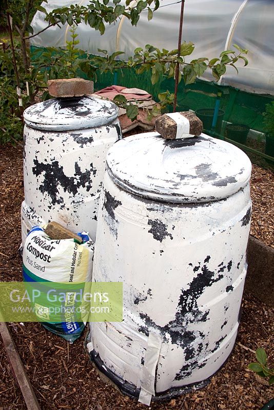 Compost bins, painted white to keep it cool in the summer to protect the worms - Mick's Allotment