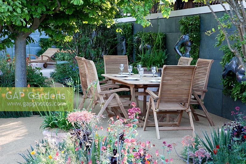 Dining area - RHS Chelsea Flower Show 2010. Foreign and Colonial Investments Garden, Designer Thomas Hoblyn