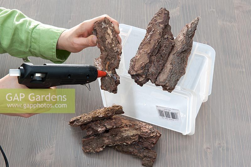 Creating a container - Glueing bark onto plastic container