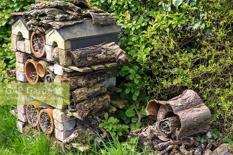 Insect house made of brick, terracotta and wood