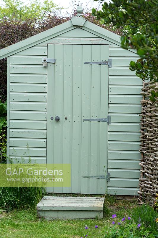 Garden shed well secured with double padlocks