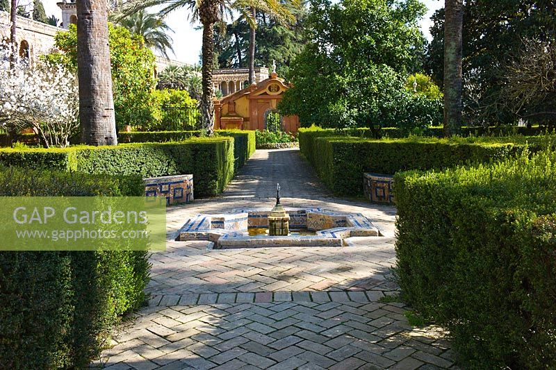 A fountain in The Ladies Garden at the Real Alcazar, Seville, Andalusia, Spain