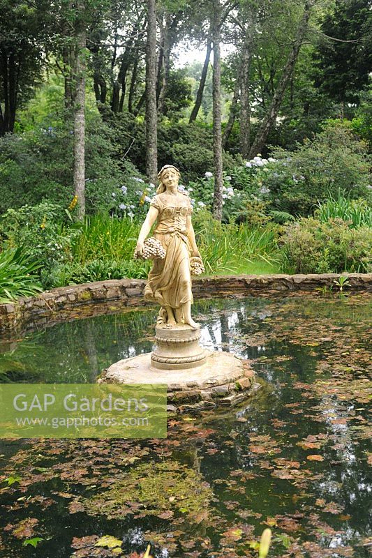 Garden feature pond with a statue 