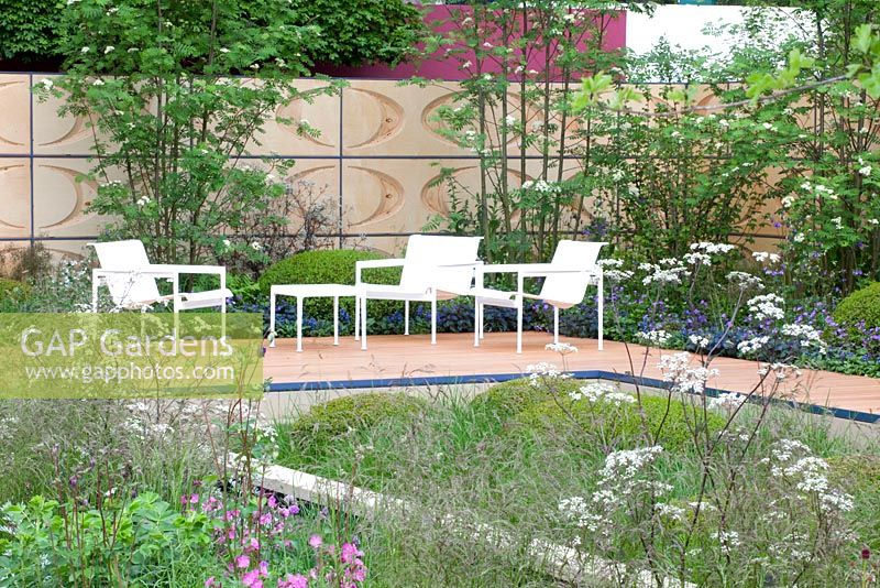 The Brewin Dolphin Garden -  contemporary garden with meadow like planting and Sorbus aucuparia