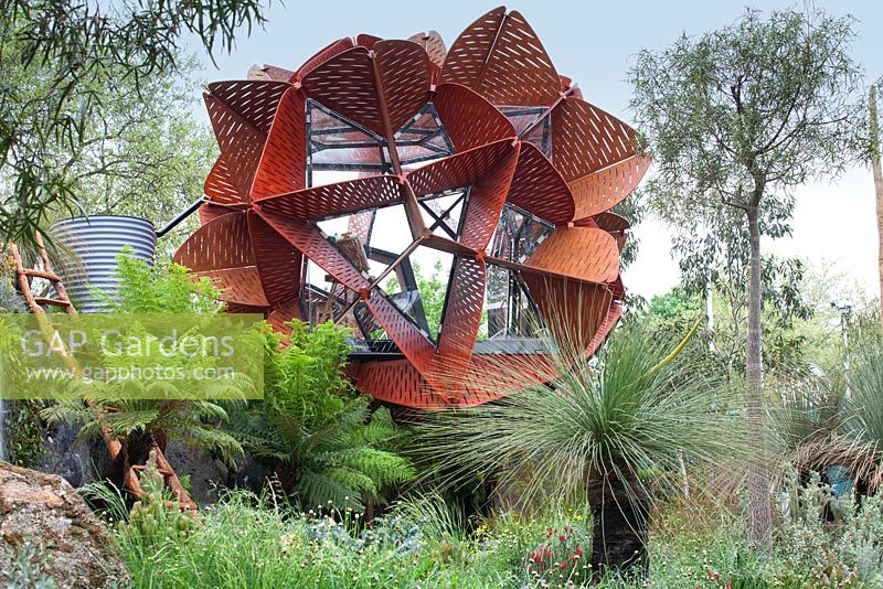 Trailfinders Australian Garden, Chelsea Flower Show 2013. Modern garden studio building with Tree Ferns