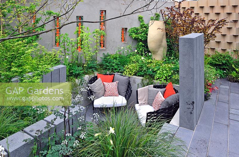 Fresh Garden - BrandAlley Garden - Chelsea Flower Show 2013 - Sunken seating area with decorative walls and recycled stone pillars