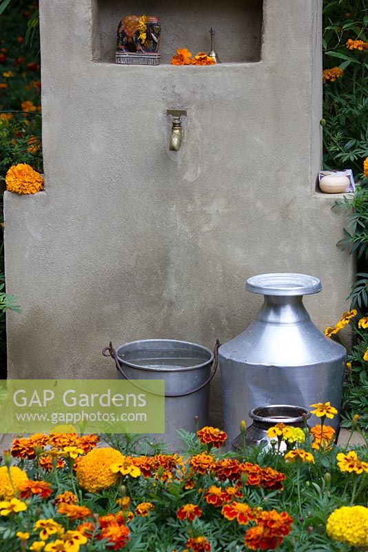 Detail of watering cans and cistern in the Herbert Smith Freehills Garden for Water Aid