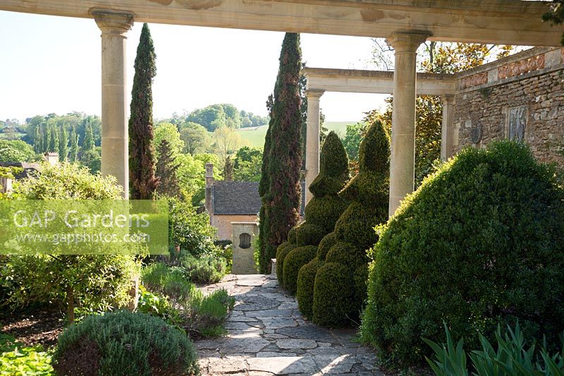 View through colonnades on the Great Terrace to countryside beyond. 