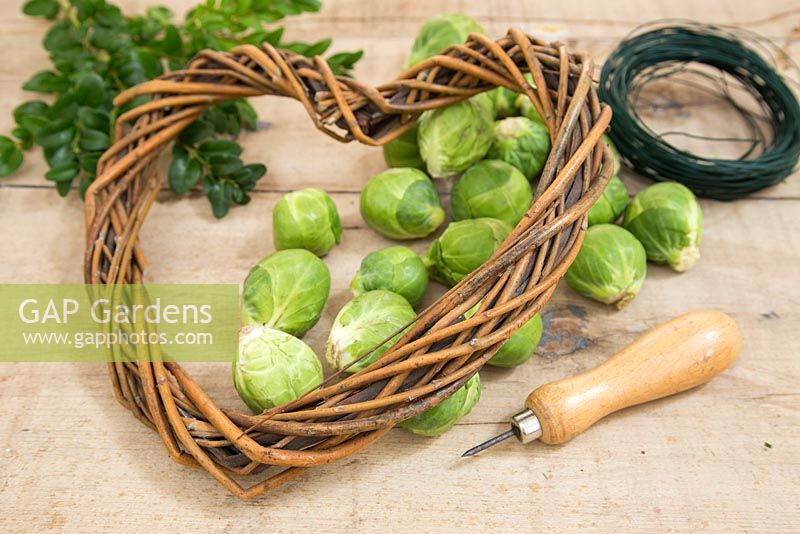 Items required are Brussel Sprouts, bradle, wreath and twine