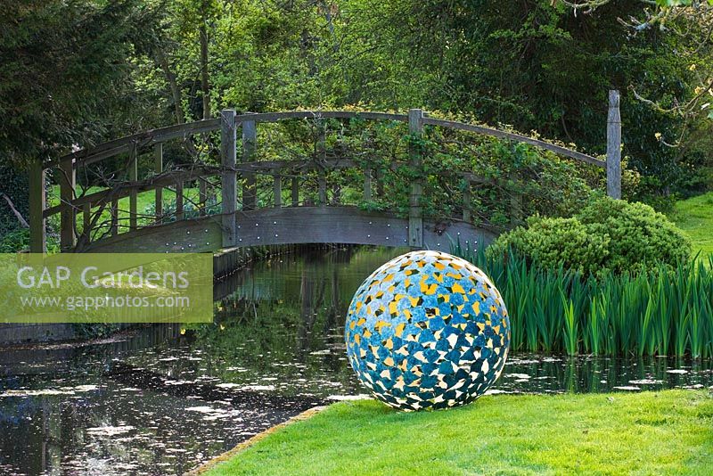 Ornamental globe on garden lawn
