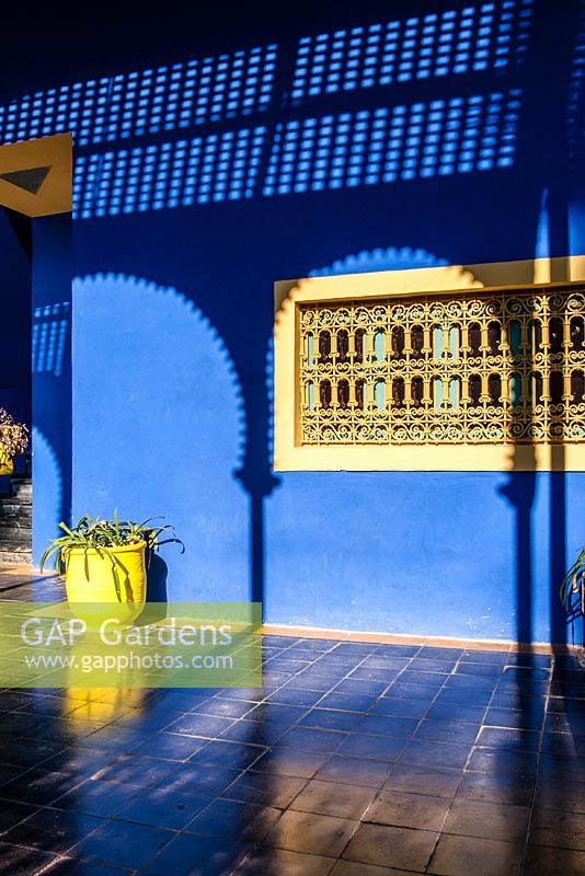 Shadows on wall. Jardin Majorelle, Marrakech, Morocco. 