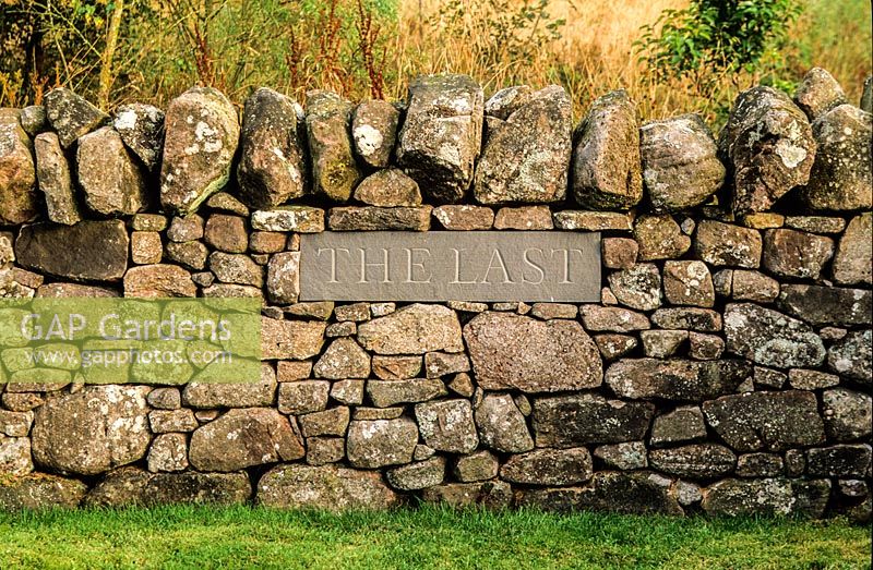 Plaque set into wall - The Last. Little Sparta, Dunsyre, Lanark, Lanarkshire. Scotland. 