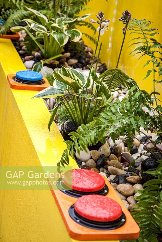 Colourful, interactive water feature - 'Work, Rest and Play' show garden, RHS Hampton Court Palace Flower Show 2012