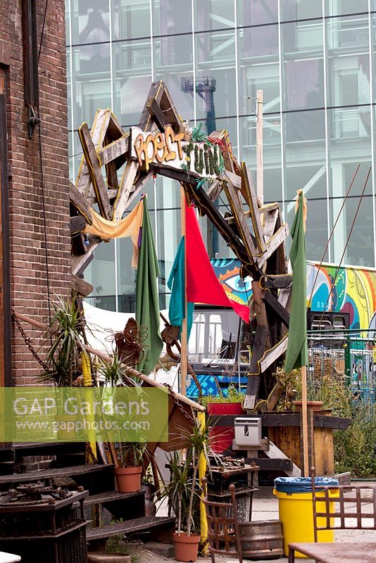 Entrance gate made of recycled material of the ROEST garden in Amsterdam.