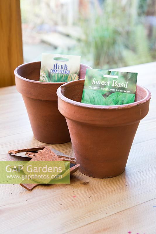 Terracotta pots, crocks and seed packets 