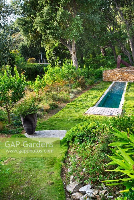 Lawn and swimming pool. Designer: Jean-Laurent Felizia, France