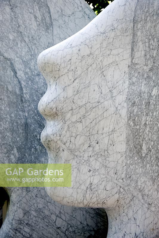 Coombe Sculpture Garden with closeup on profile of large marble head.